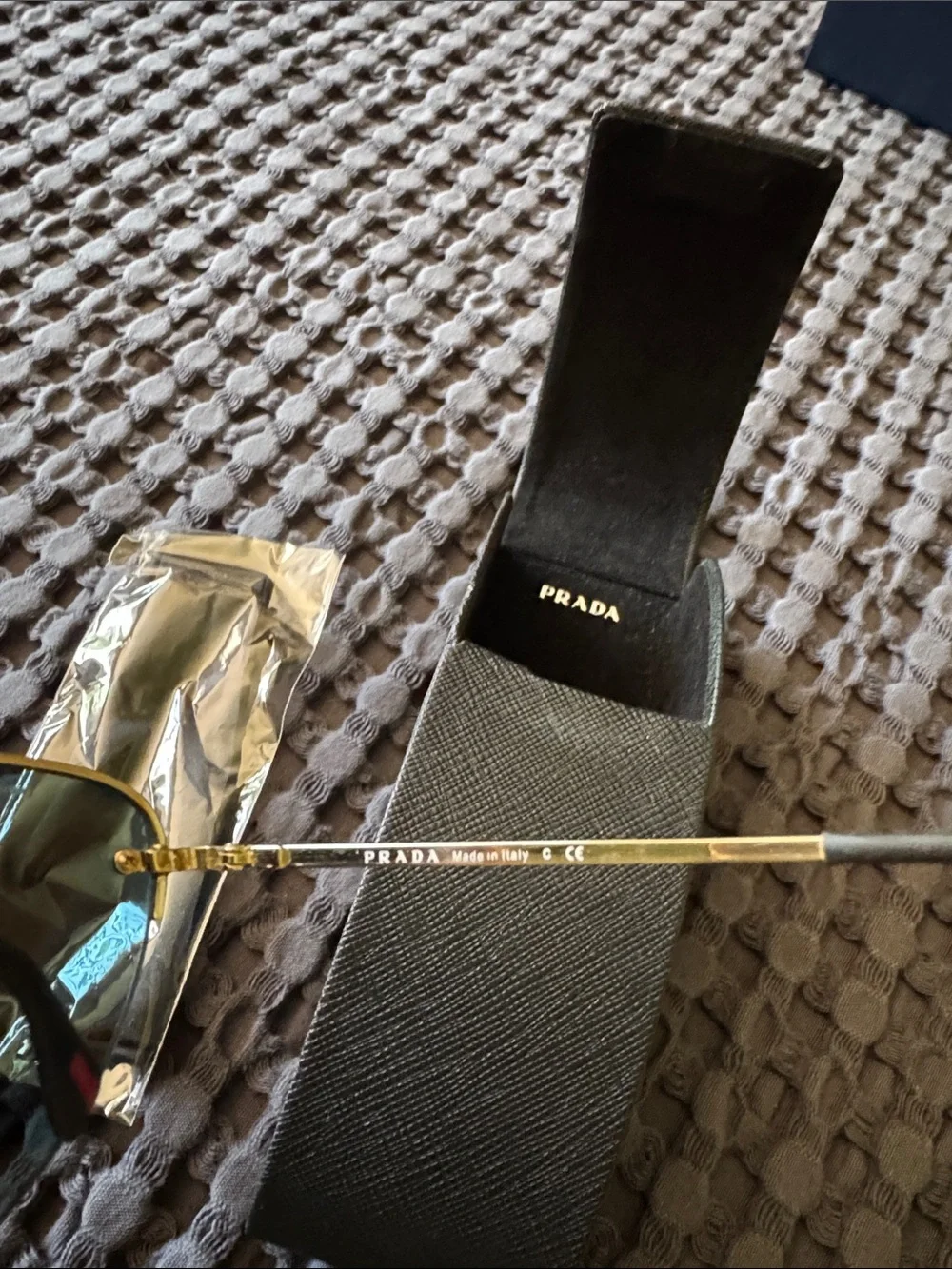 Prada Gold Frame Sunglasses with Orange-Red Mirrored Lenses
